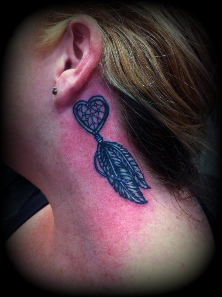 dreamcatcher tattoo with heart instead of woven net