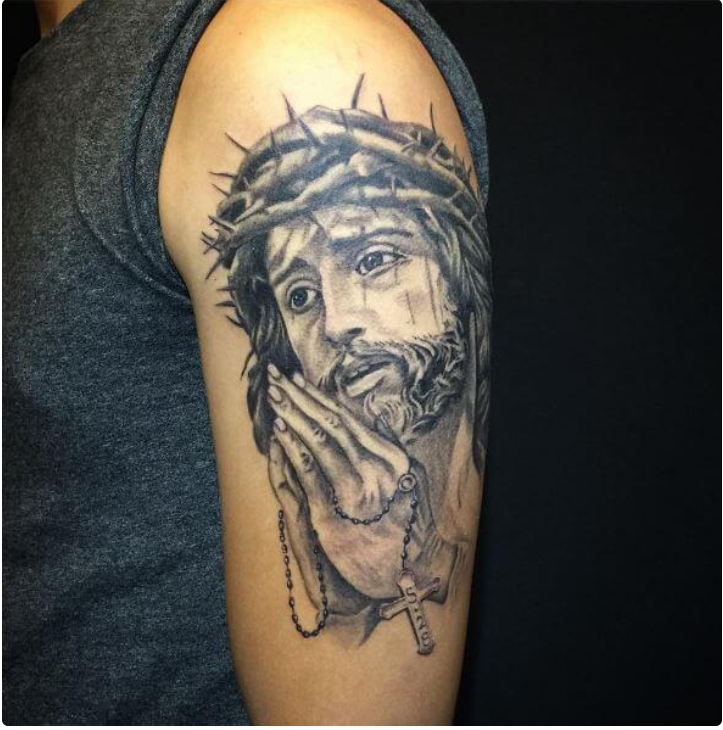 praying hands jesus tattoo