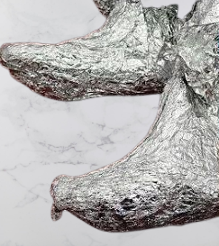 feet wrapped in aluminum foil
