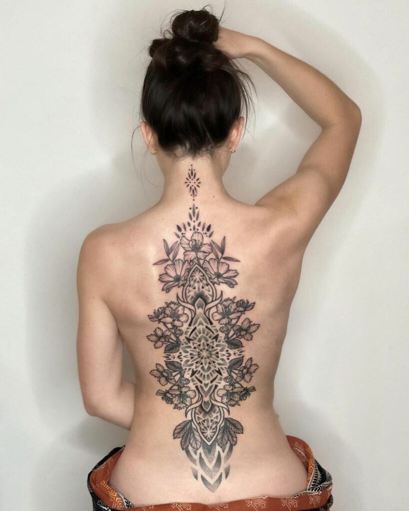 Mandala Spine tattoo for women