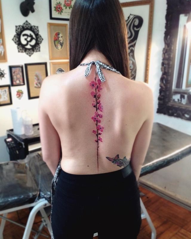 Cherry Blossom Spine tattoo for women