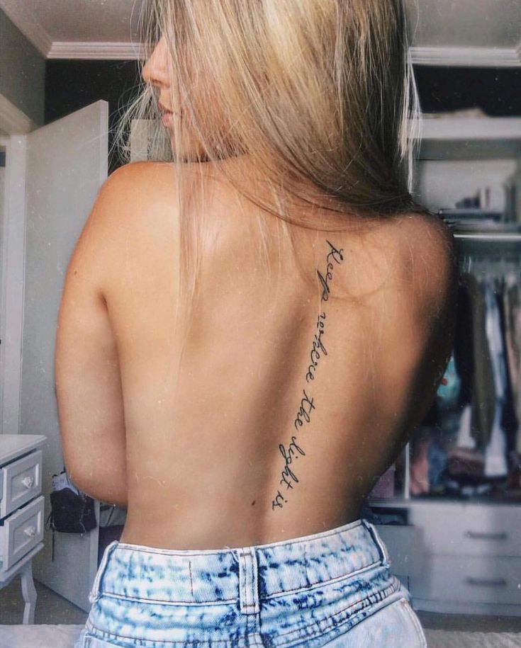 Lettering Spine tattoo for women