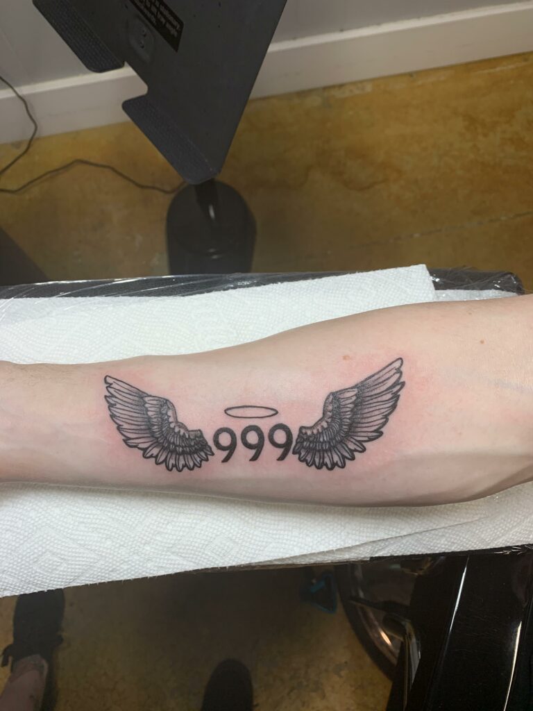 999 tattoo