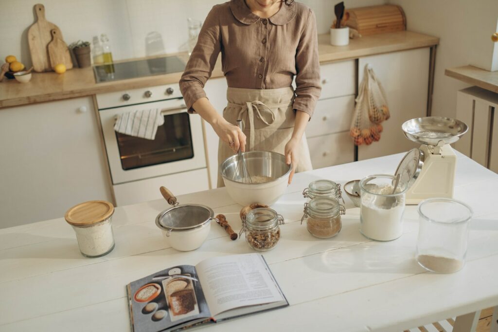 women is passionately preparing cake batter in the kitchen, showcasing her love for baking which is one of her favorite hobbies for women