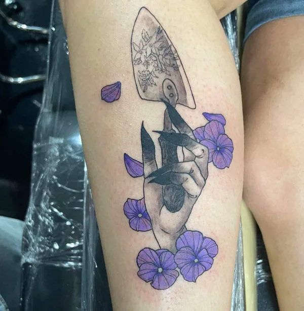 violet flower tattoo