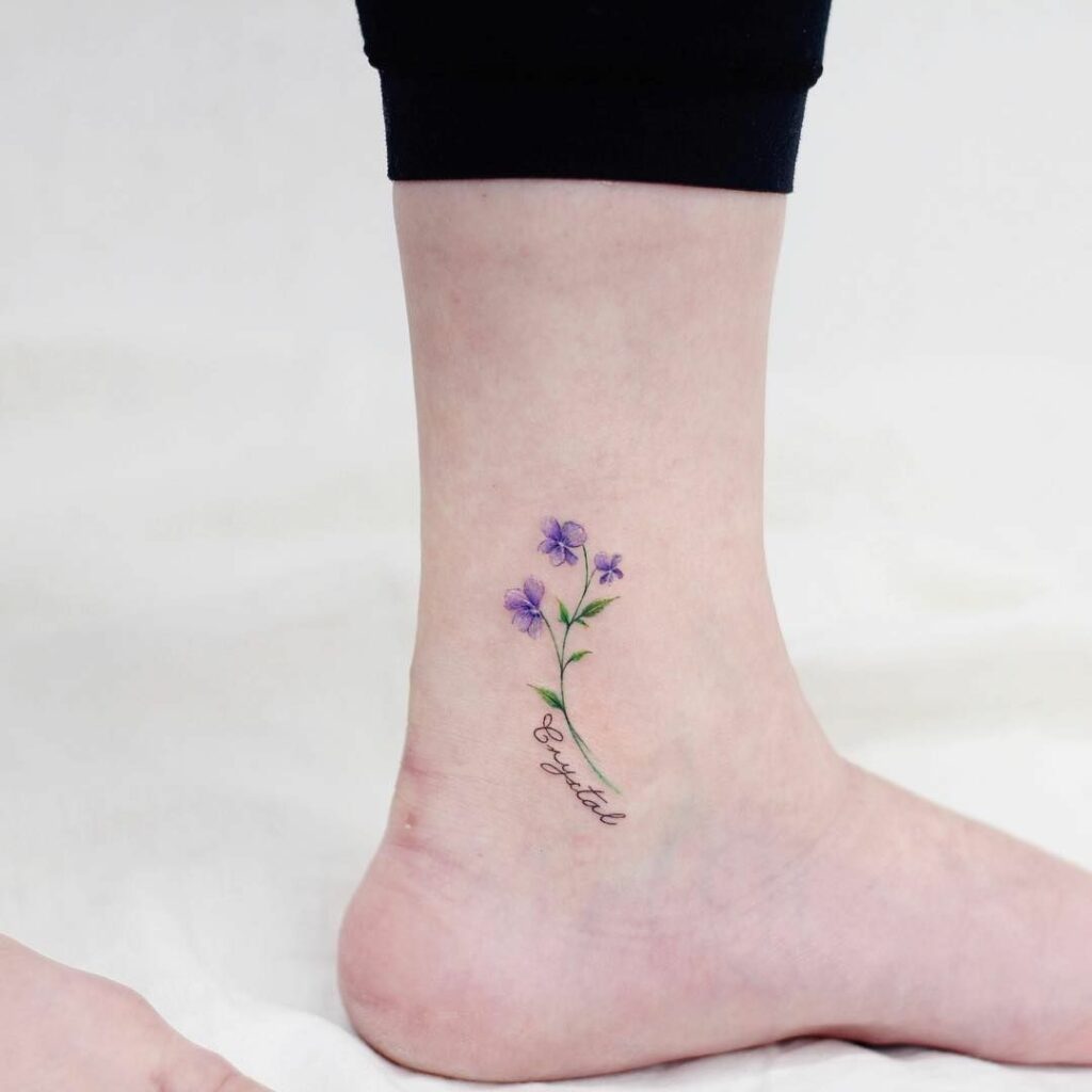 violet flower tattoo