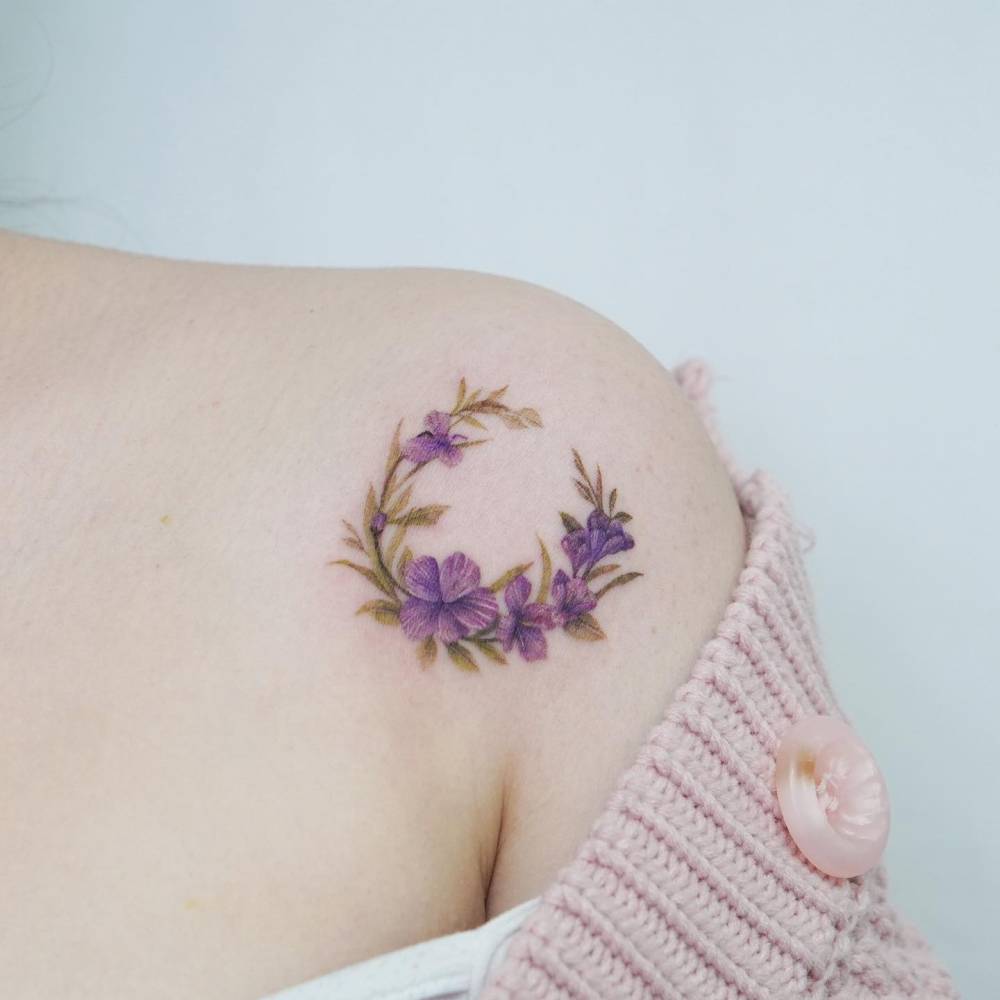 violet flower tattoo